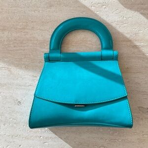 Brand new Charles and Keith Turquoise Handbag